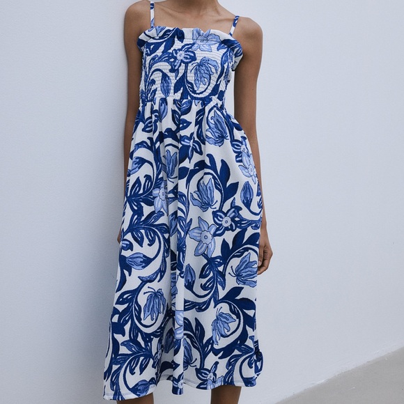 H&M Dresses & Skirts - Blue and White smocked floral dress in Medium. Worn once. Perfect for Greece! 🇬🇷